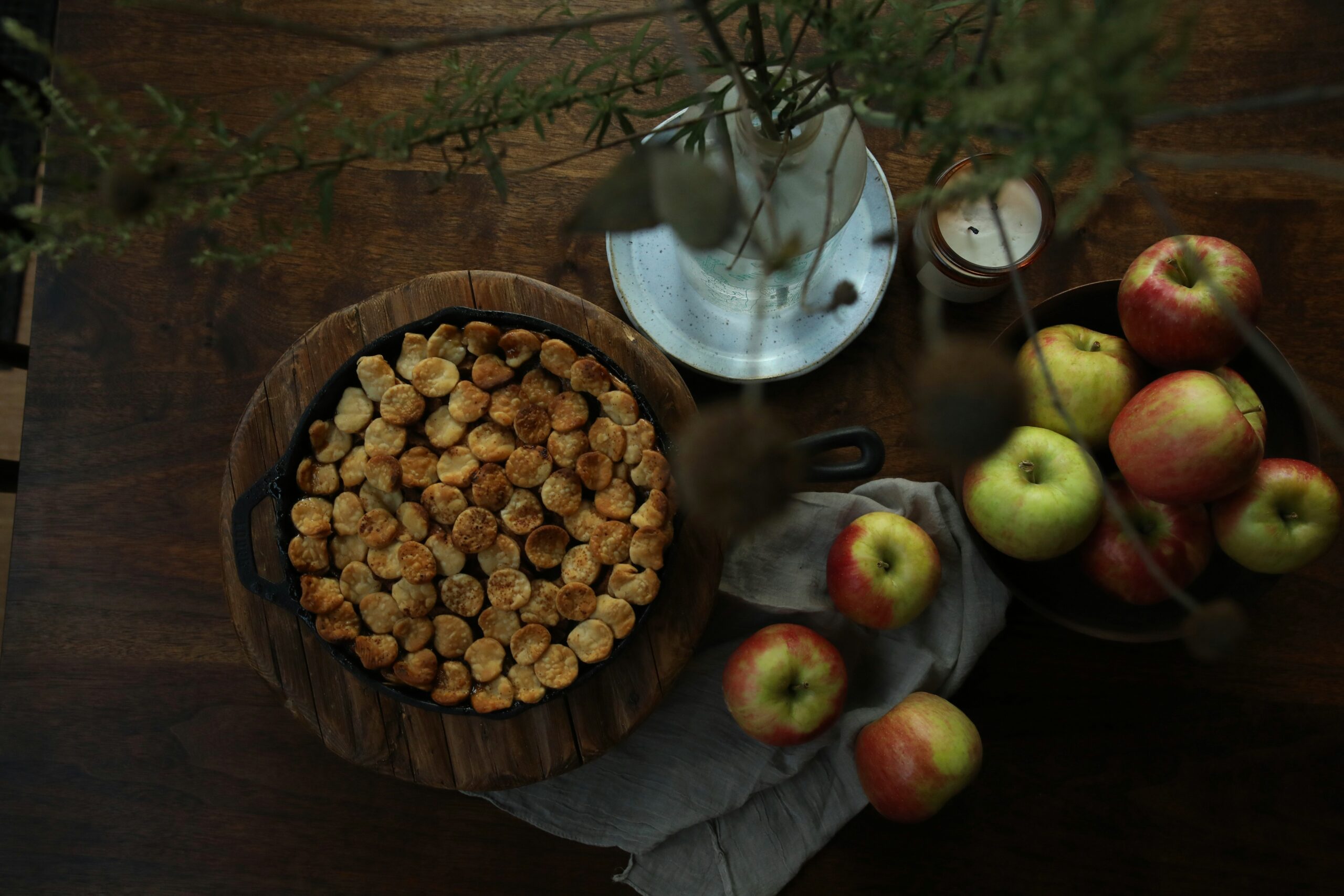 A comparison image showing a bowl of fruit next to a plate of chips