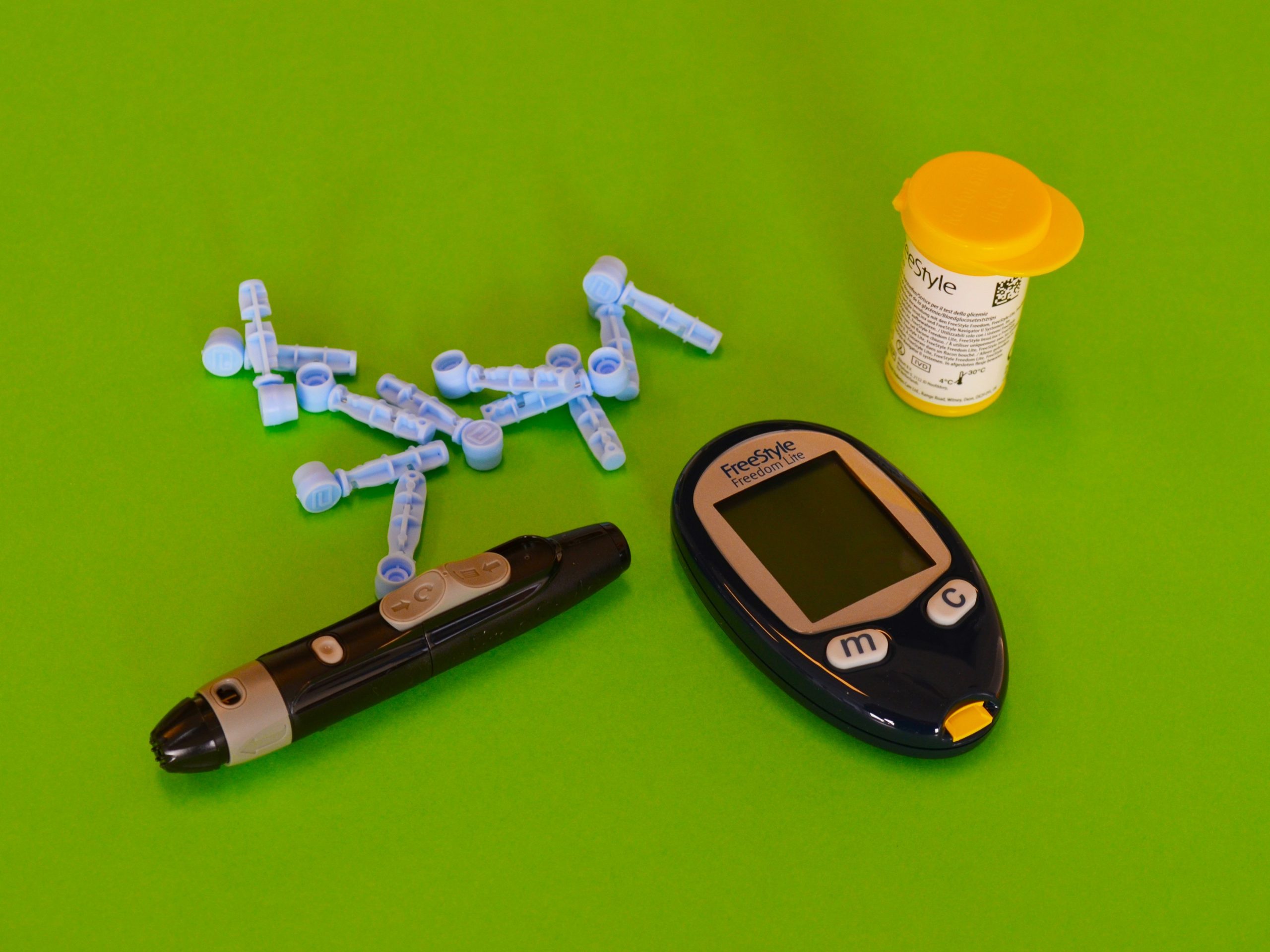 A woman checking her blood sugar after using Gymnema Sylvestre