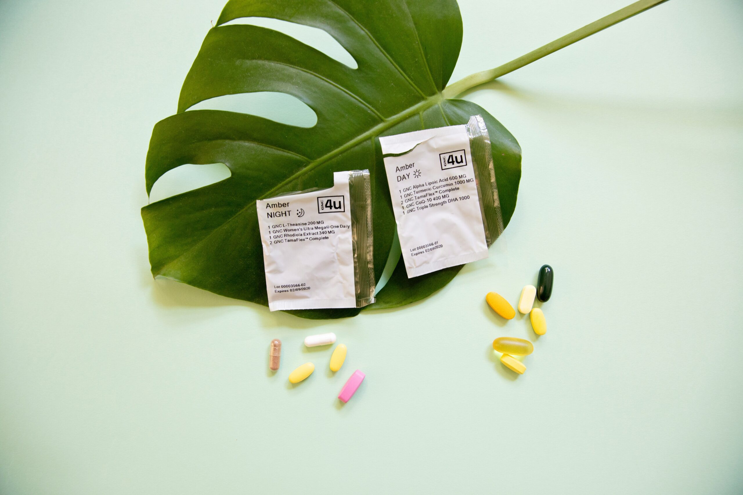 Bottle of gymnema sylvestre capsules on wooden table