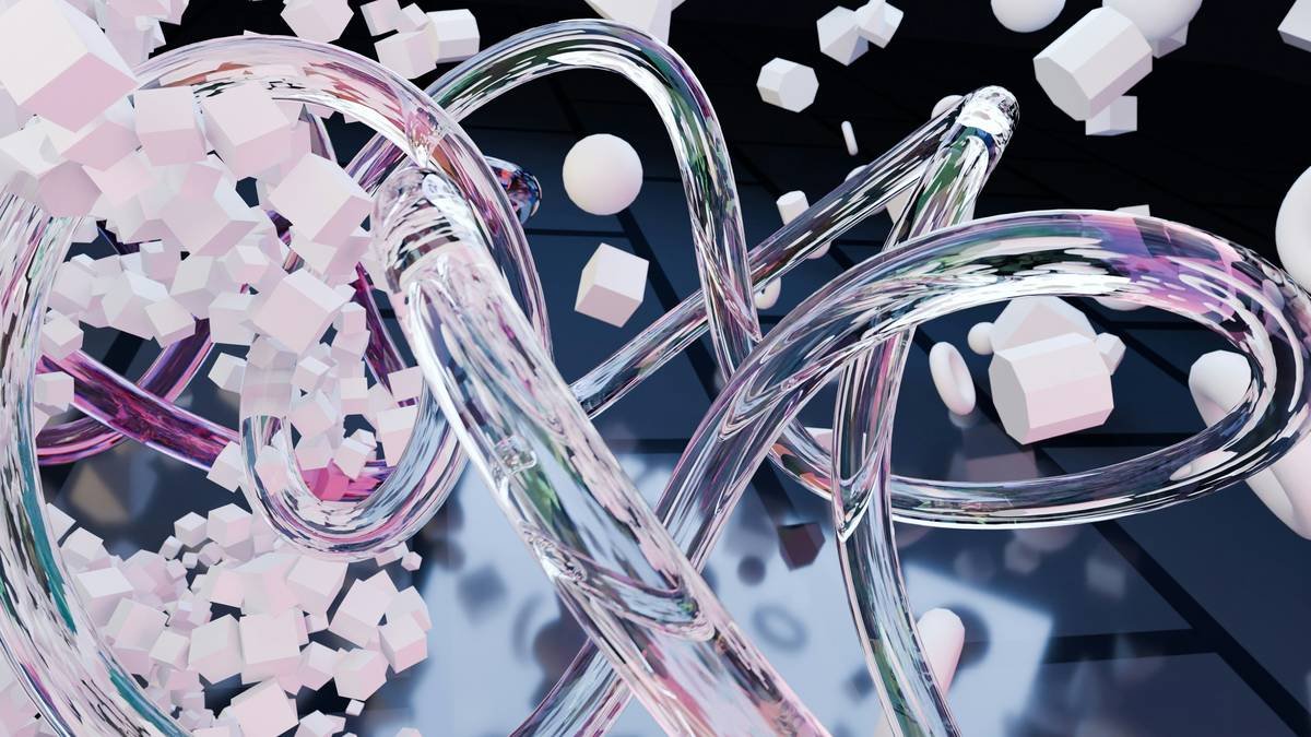 Clear twisted tubes and pink particles against a dark background.